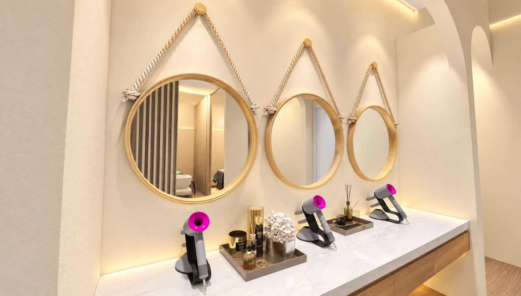 Round mirrors and styling stations at Jade Wellness